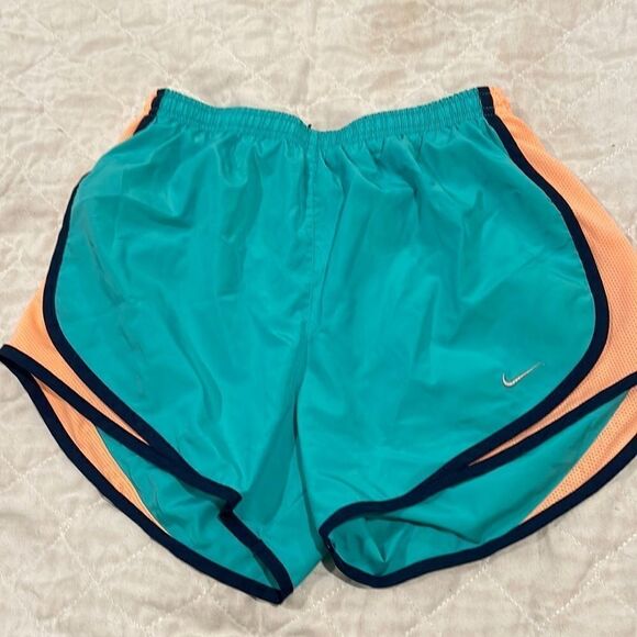NIKE Teal and pale orange running shorts - Picture 1 of 4